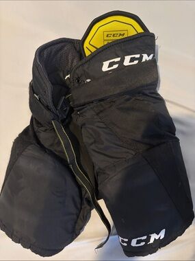 CCM Black Hockey Pants with Yellow Accents YT - L